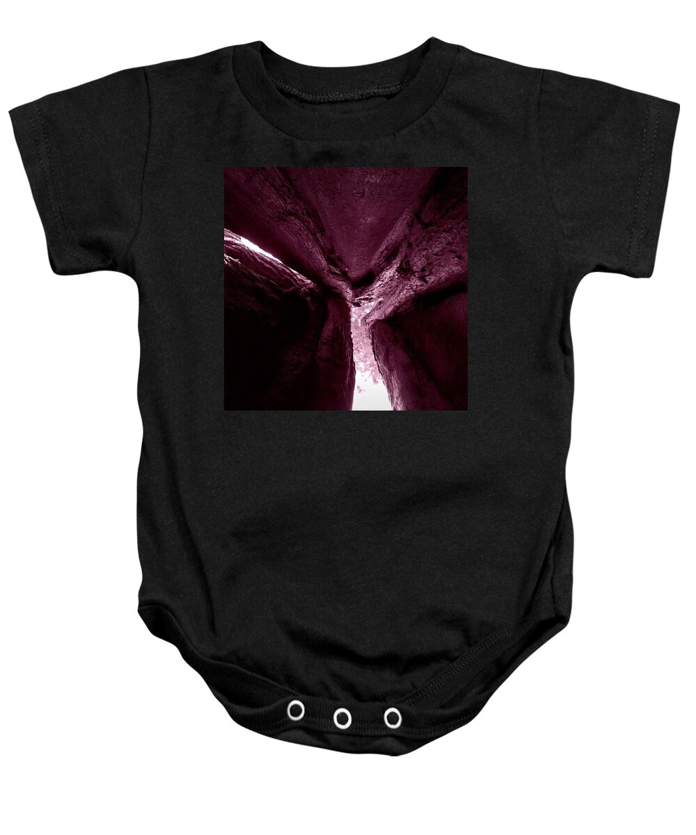I Believe In Giants Baby Onesie featuring the photograph In The Belly Of A Two Headed Giant #1 by Leah McPhail