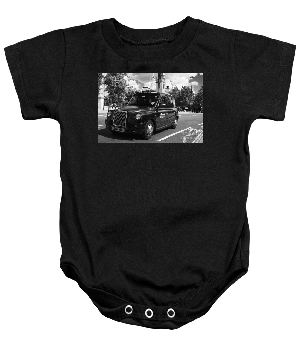 London Baby Onesie featuring the photograph London Taxi by Agusti Pardo Rossello