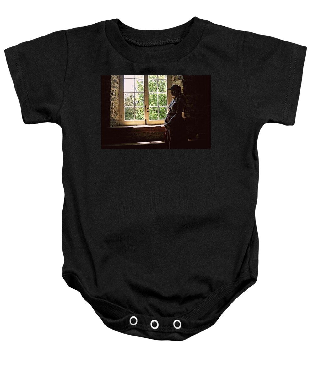 Solitude Baby Onesie featuring the photograph Looking out of the window by Tatiana Travelways