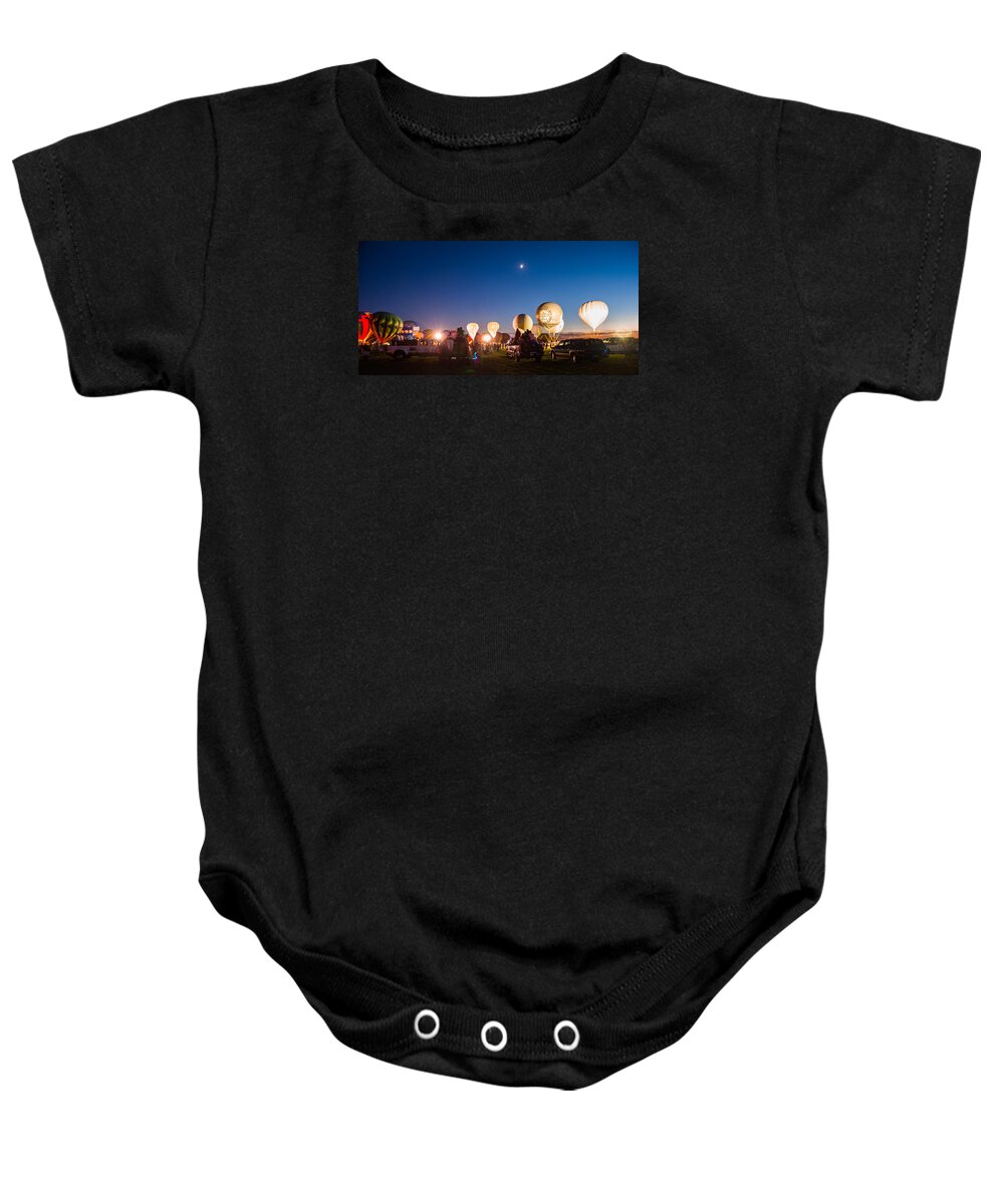 Multiple Hot Air Balloons Baby Onesie featuring the photograph Multiple Hot air Balloons night glow by Charles McCleanon