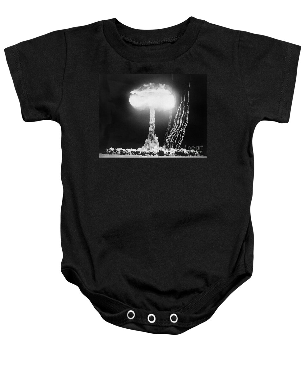 1950s Baby Onesie featuring the photograph Mushroom Cloud At Nevada Test Site by H Armstrong Roberts ClassicStock