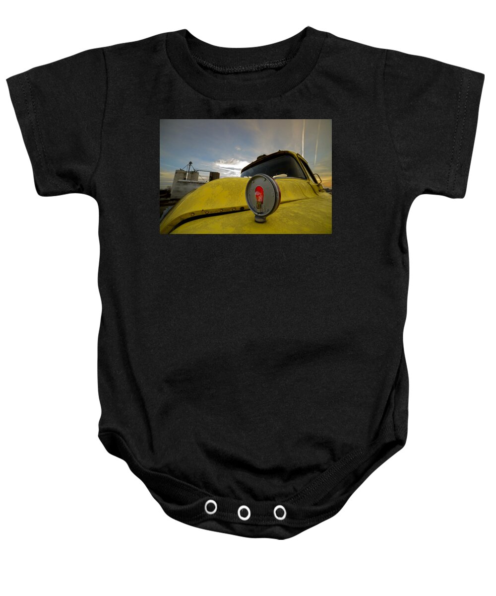 Chevy Baby Onesie featuring the photograph Old Chevy Truck with Grain Elevators in the Background by Art Whitton