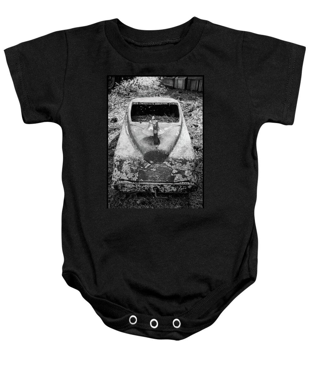 Antique Peddle Car Baby Onesie featuring the photograph Peddle car by Matthew Pace