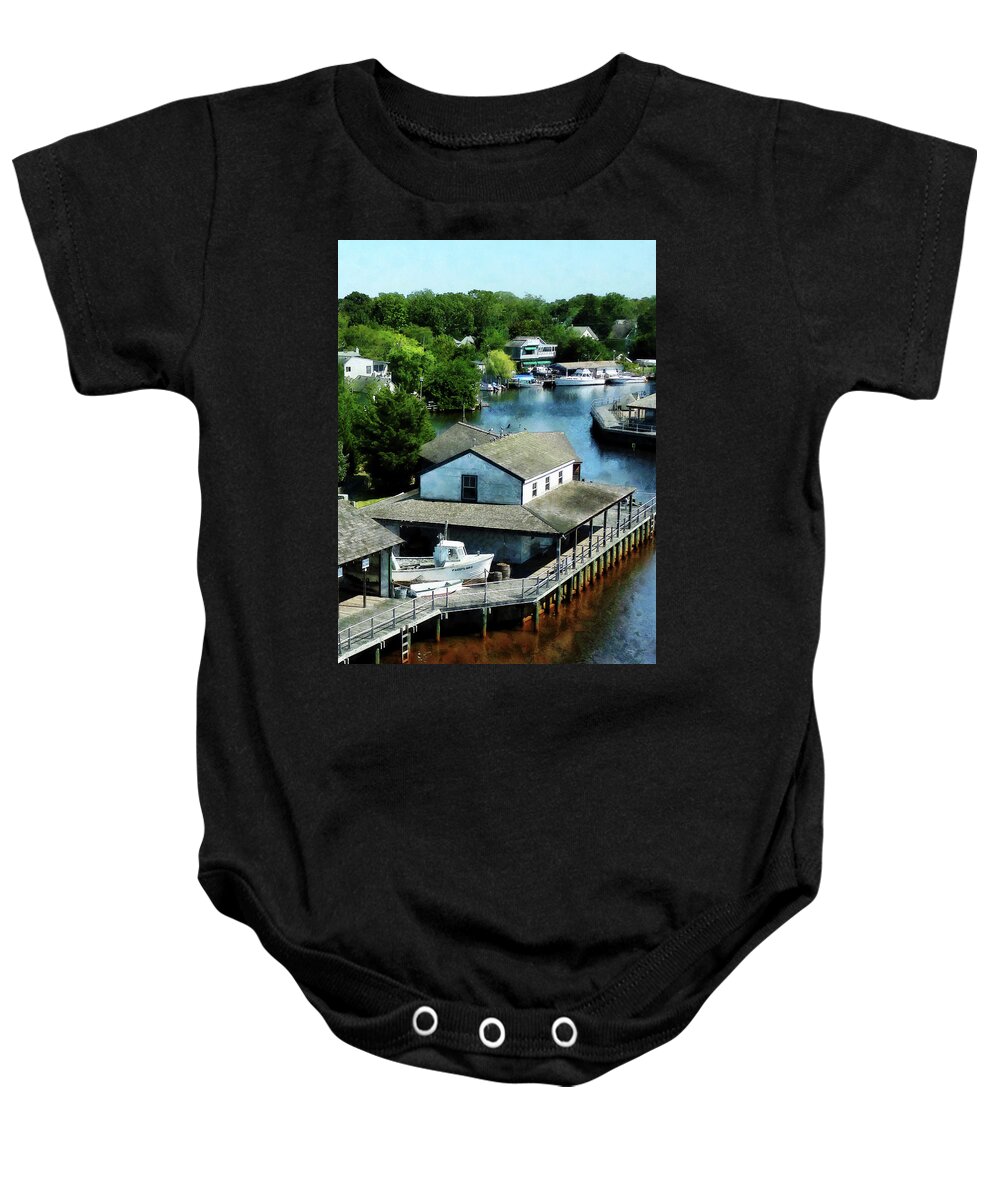 Boat Baby Onesie featuring the photograph Seaside Town by Susan Savad