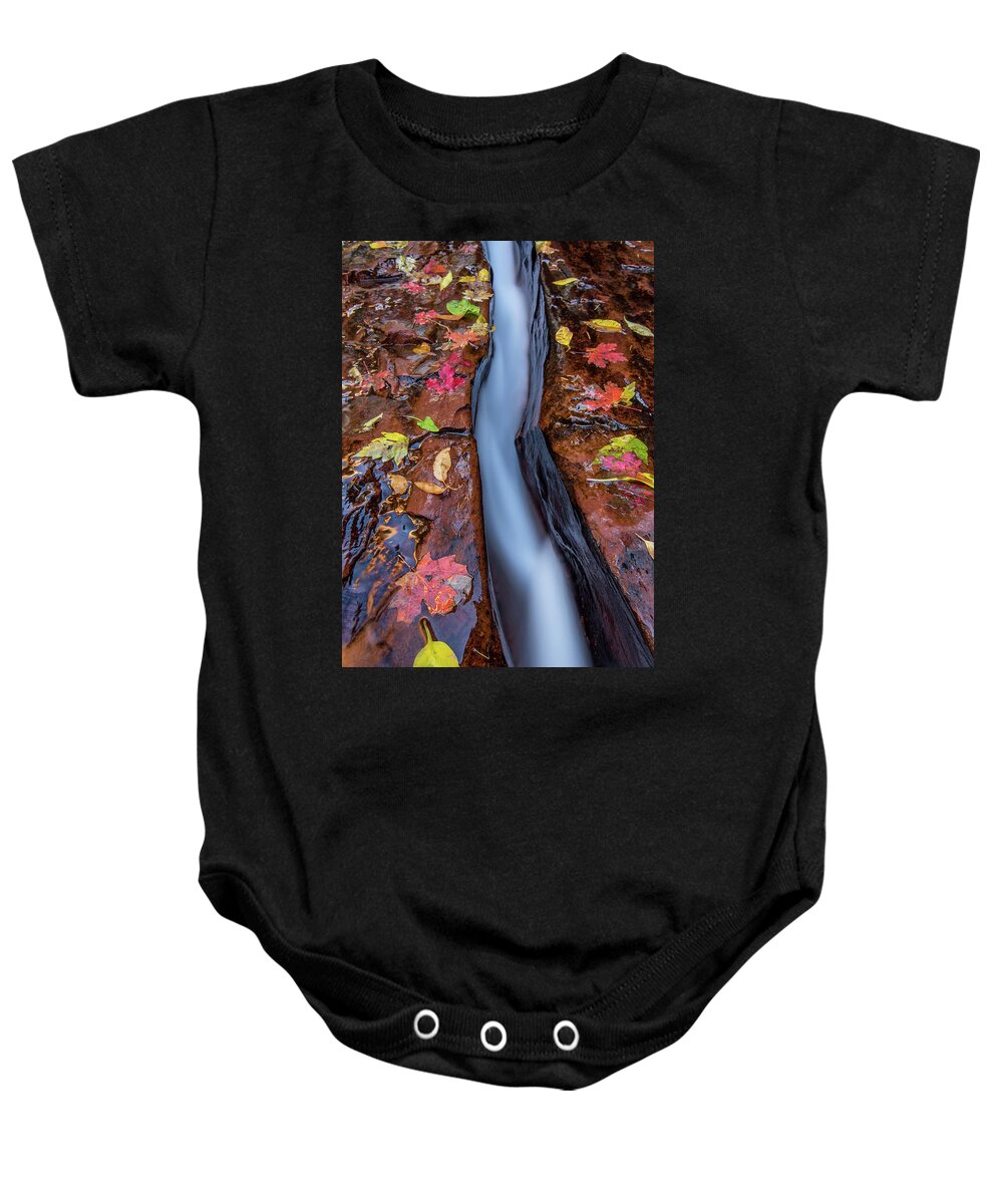 Zion Baby Onesie featuring the photograph The Crack by Wesley Aston