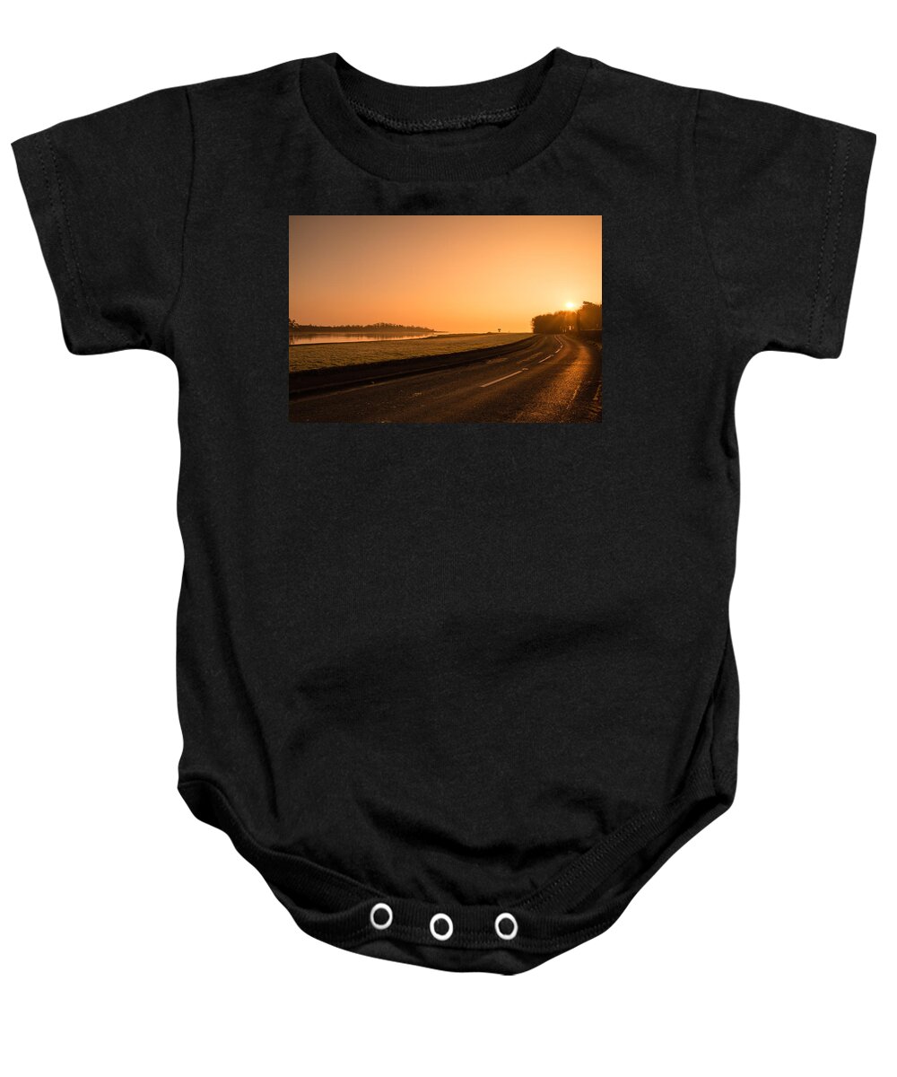 The Estuary Road Baby Onesie featuring the photograph The Estuary Road by Martina Fagan