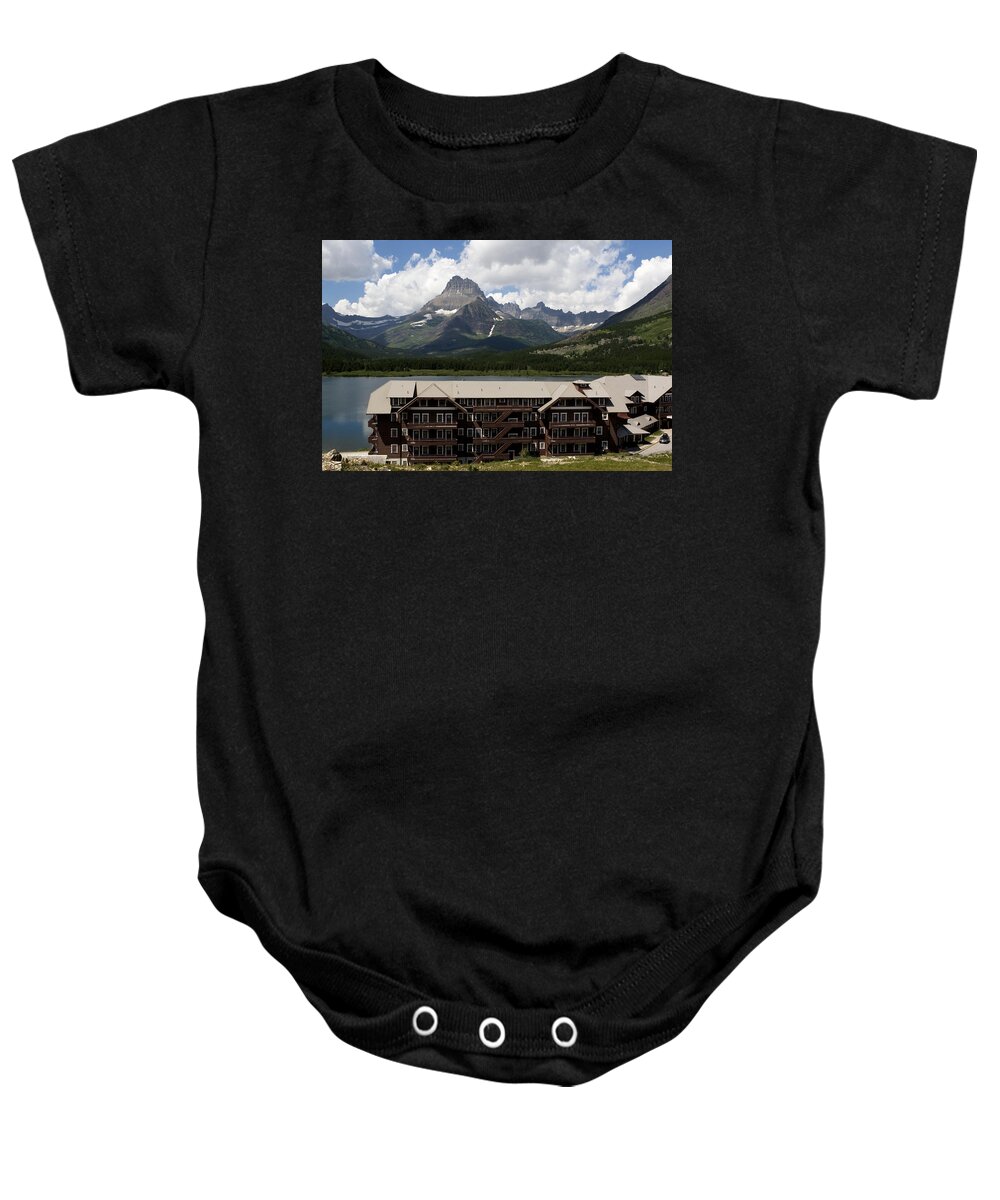 Many Glacier Lodge Baby Onesie featuring the photograph The Hills Are Alive by Lorraine Devon Wilke