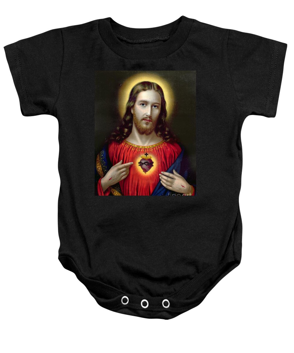 #faatoppicks Baby Onesie featuring the painting The Sacred Heart of Jesus by English School