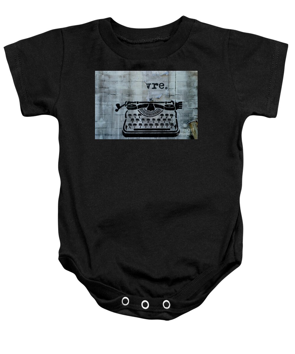 Nola Baby Onesie featuring the photograph Typed Graffiti In New Orleans Louisiana by Michael Hoard