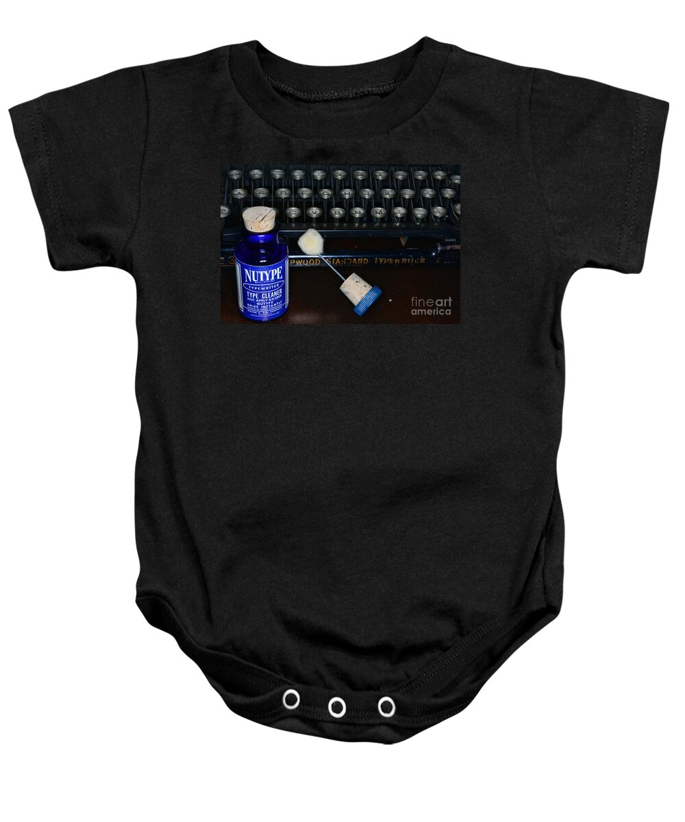 Paul Ward Baby Onesie featuring the photograph Typewriter Time to Clean the Keys by Paul Ward