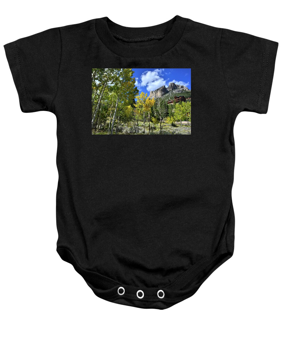 Humboldt-toiyabe National Forest Baby Onesie featuring the photograph Village Beneath Mt. Charleston by Ray Mathis