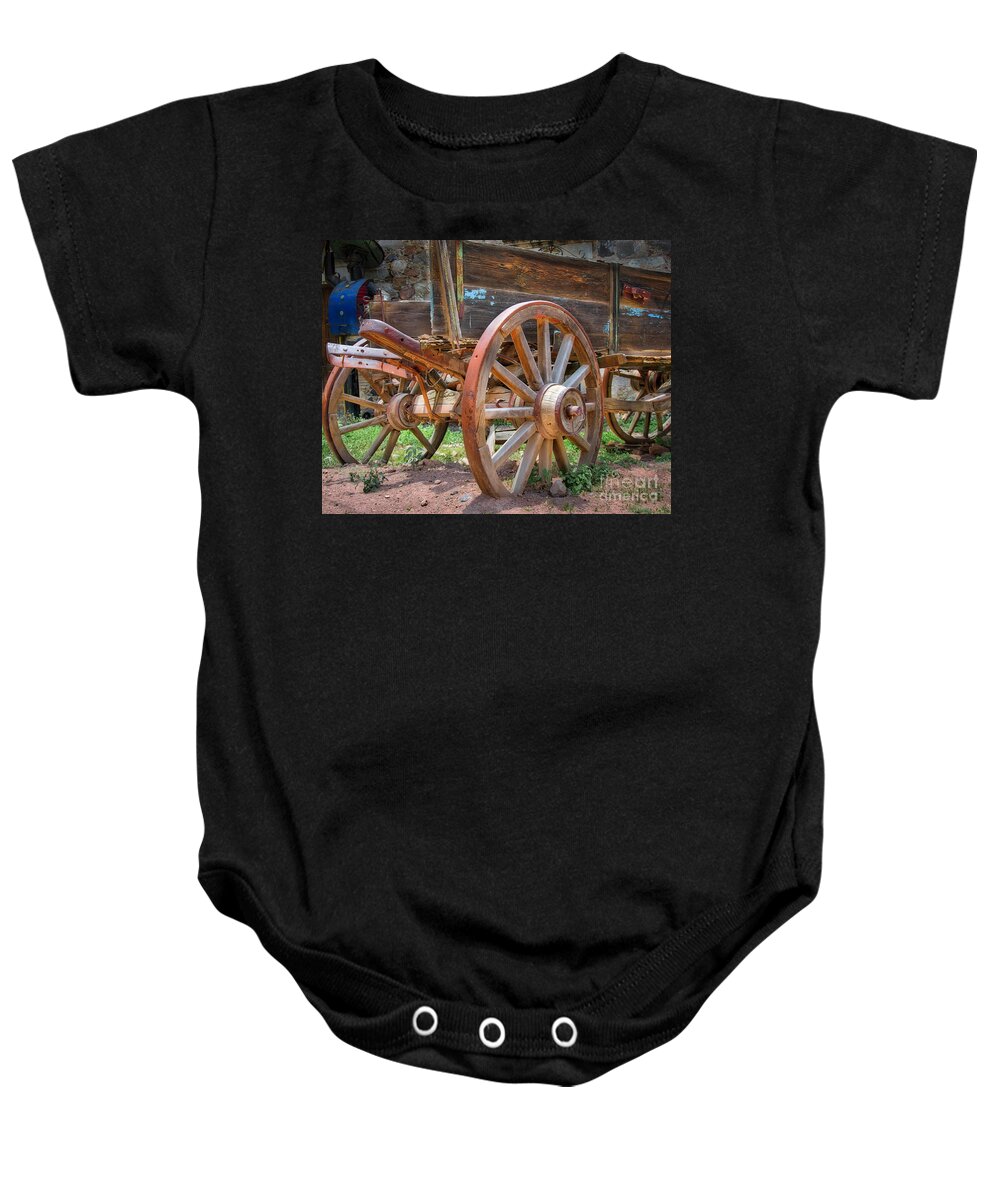 Wagon Baby Onesie featuring the photograph Wagons Ho by Barry Weiss