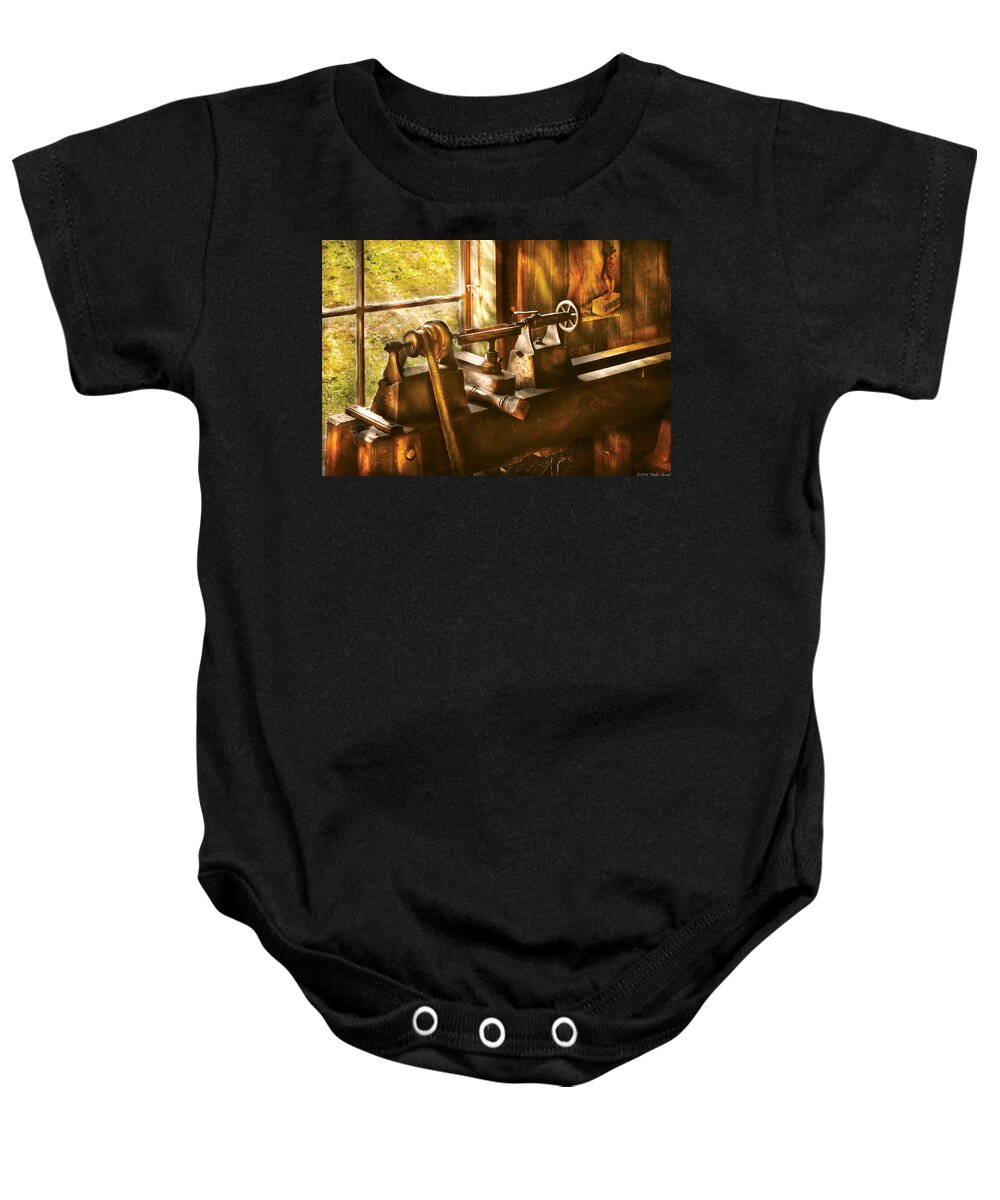 Woodworker Baby Onesie featuring the photograph Woodworker - An Old Lathe by Mike Savad