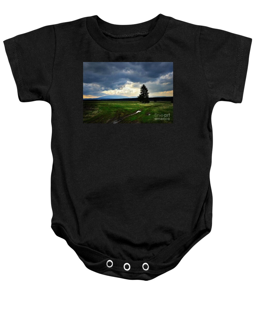 Sunset Baby Onesie featuring the photograph Dark Heavy Clouds Above The Autumn Landscape by Jozef Jankola