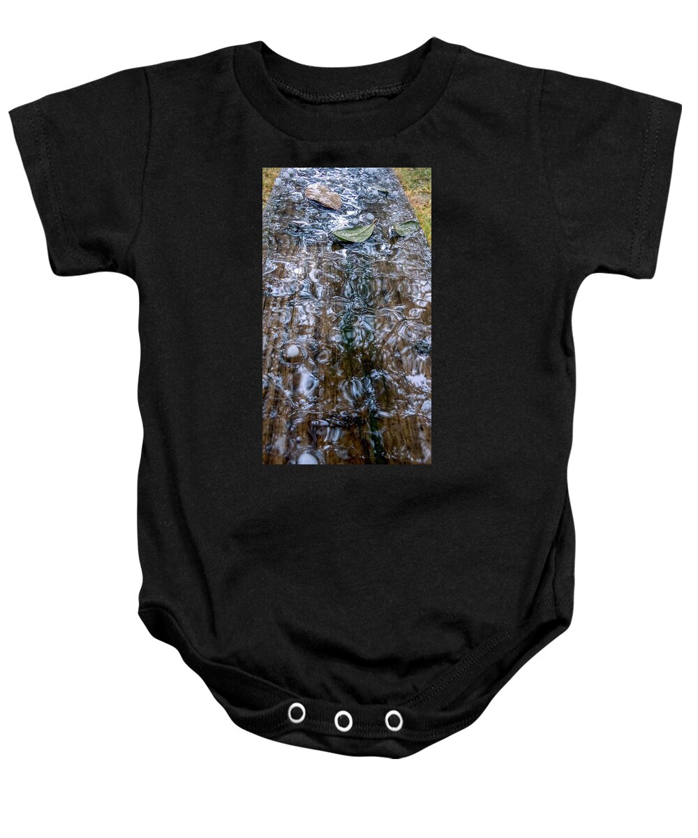 Hail Baby Onesie featuring the photograph Hail Fluidity by Ivars Vilums