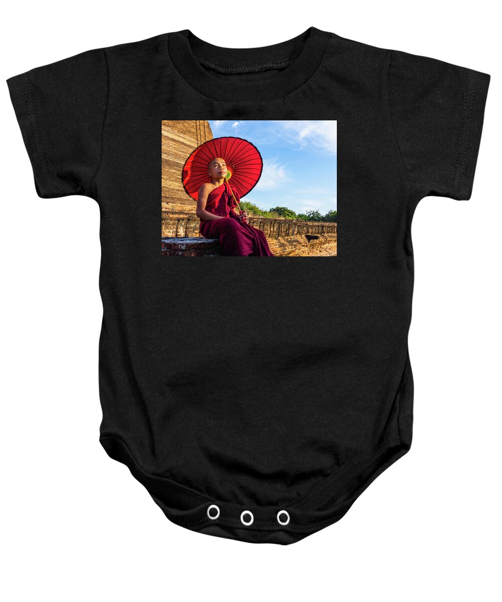 Boy Baby Onesie featuring the photograph Novice Monk In The Sun by Ann Moore