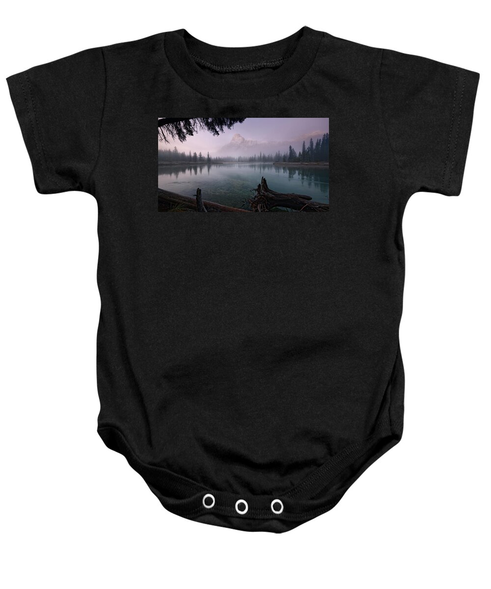 Banff Baby Onesie featuring the photograph Rising From The Fog by Dan Jurak