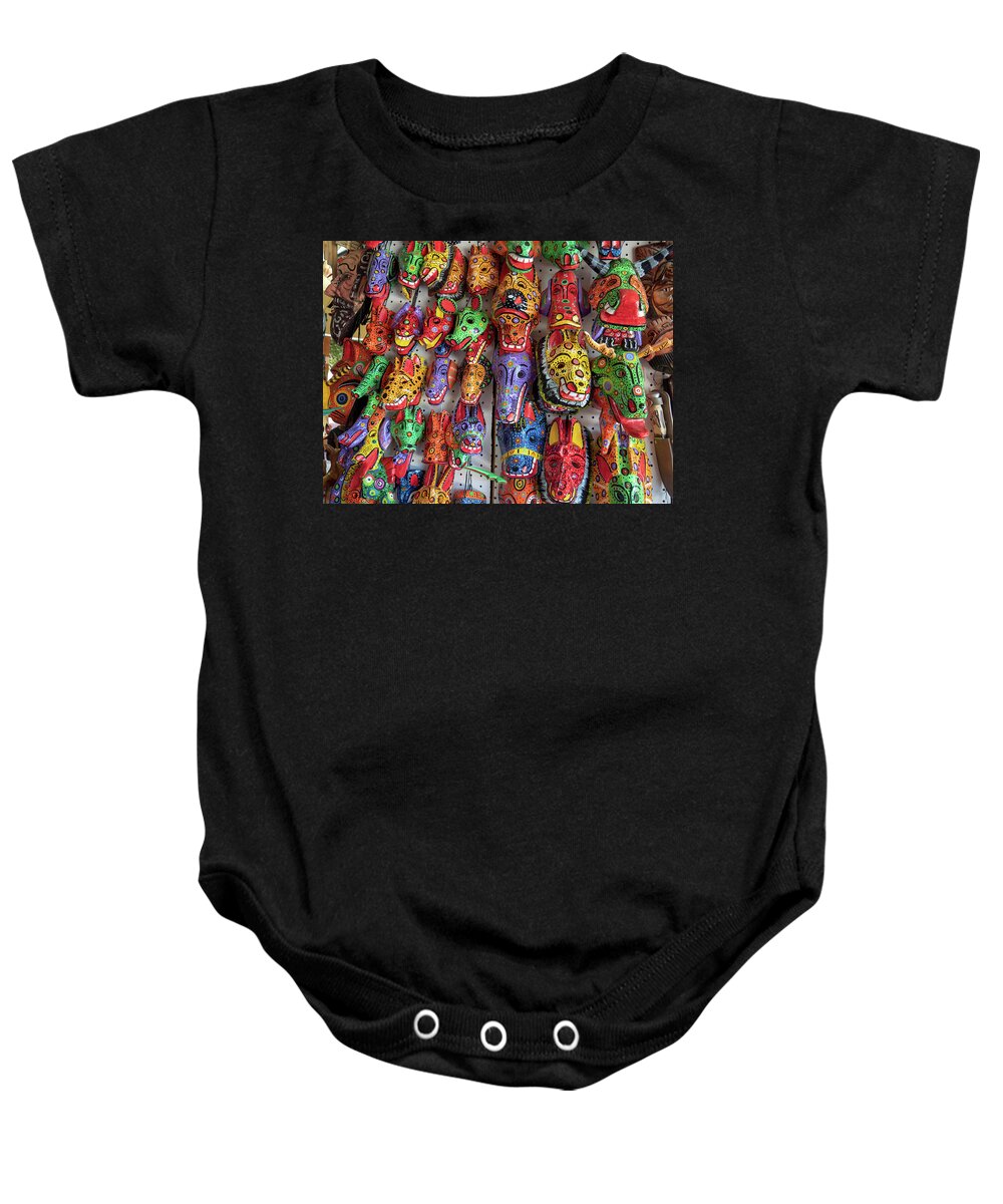Masks Baby Onesie featuring the photograph A Wall of Color by Leslie Struxness