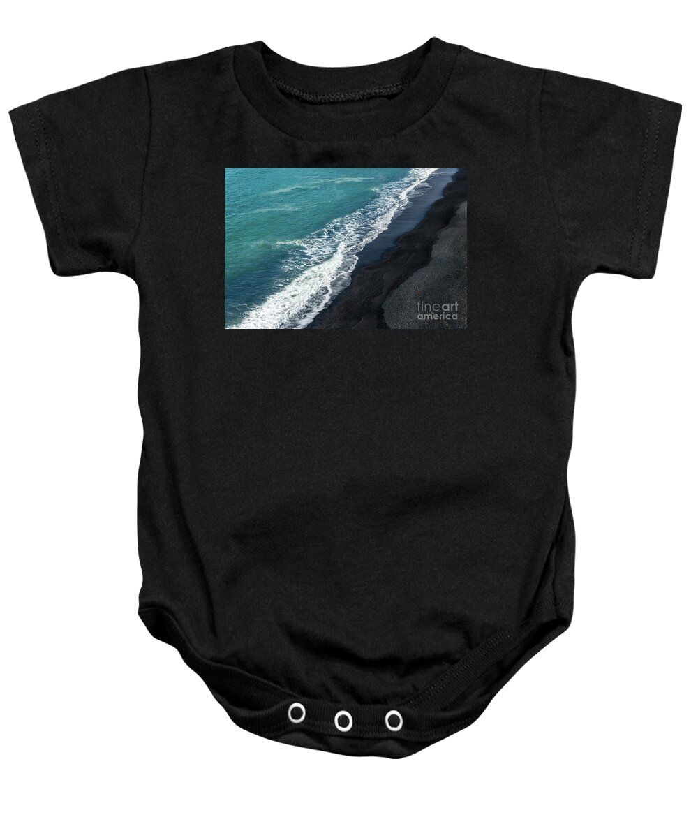 Black Baby Onesie featuring the photograph Black beach abstract by Delphimages Photo Creations