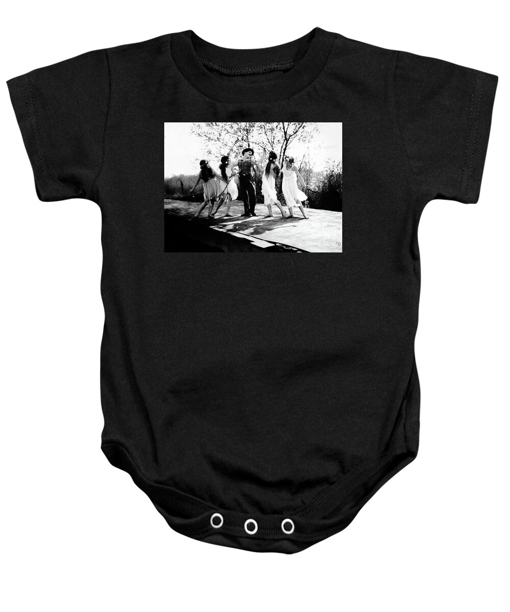 Dancing Baby Onesie featuring the photograph Charlie Chaplin Frolicking with Dancing Nymphs by Sad Hill - Bizarre Los Angeles Archive