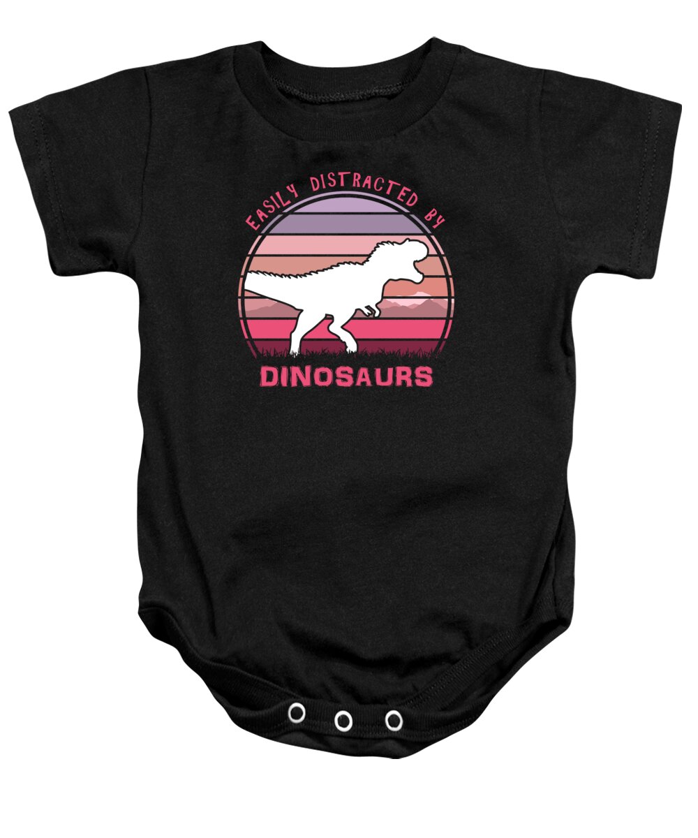 Easily Baby Onesie featuring the digital art Easily Distracted By Dinosaurs Pink Sunset by Megan Miller