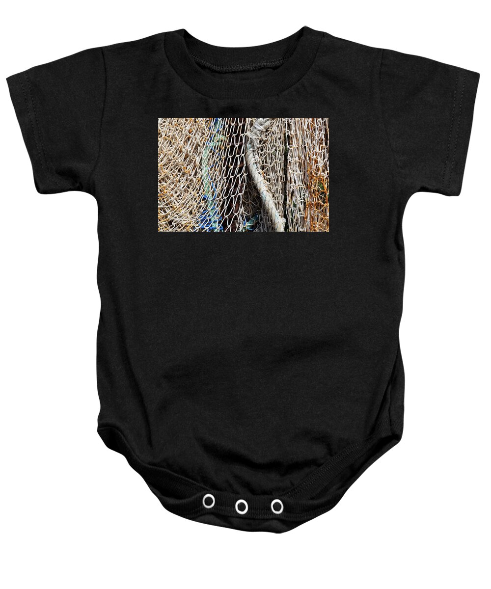 Fishing Net Baby Onesie featuring the photograph Fishing nets and ropes by Fabiano Di Paolo