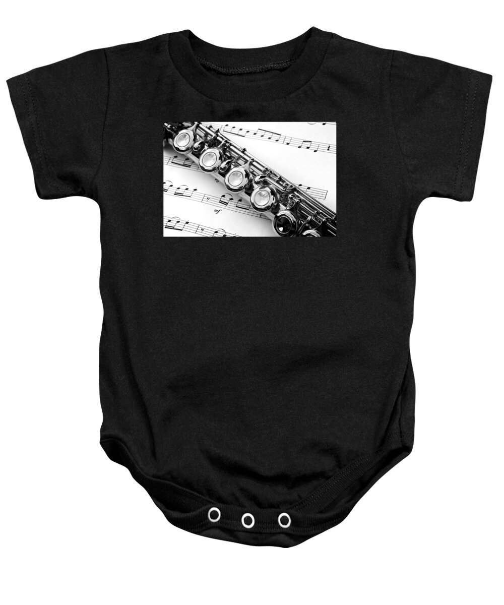 Flute Baby Onesie featuring the photograph Flute and sheet music by Delphimages Photo Creations