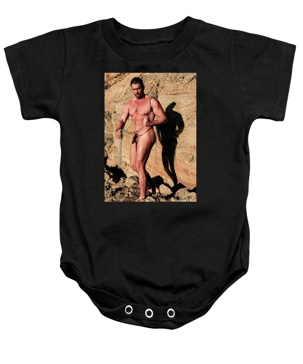 Nude Baby Onesie featuring the photograph Nude male bodybuilder breaking chains by Gunther Allen