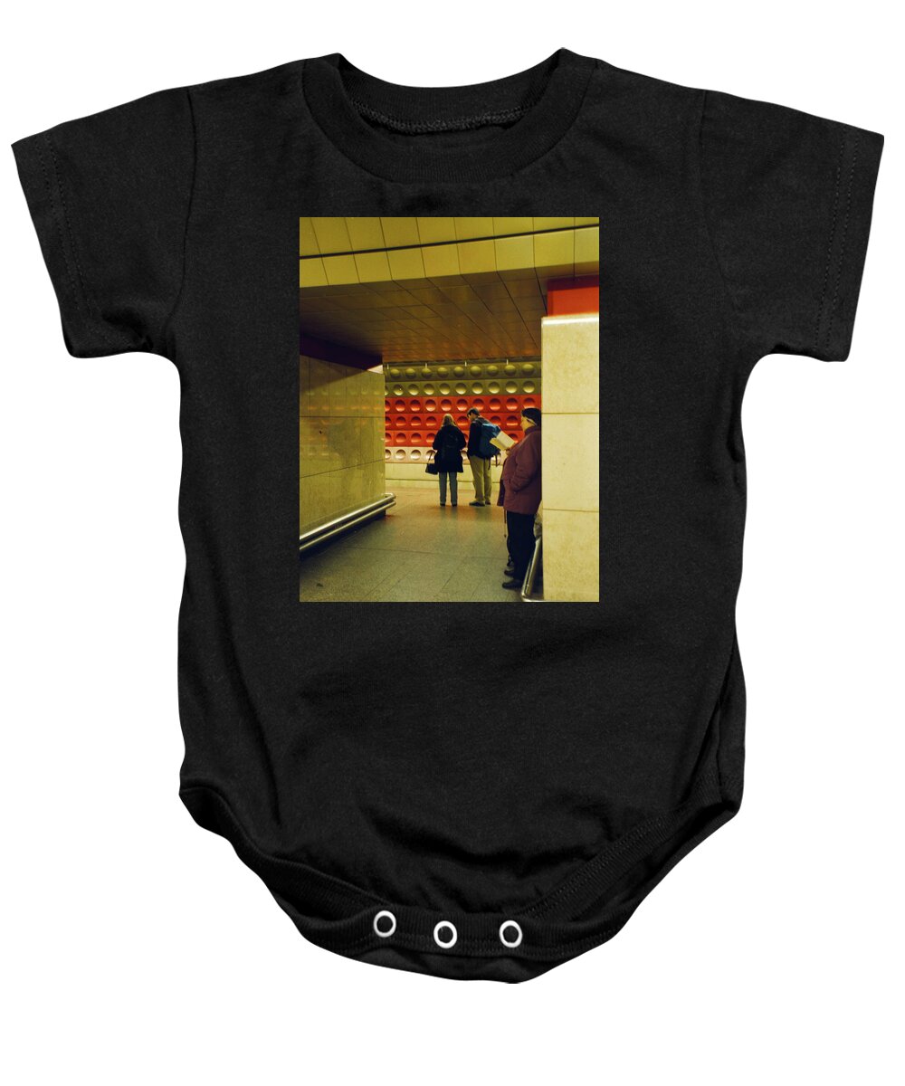 Person Baby Onesie featuring the photograph Person Reading while Waiting for Train in Prague by Matthew Bamberg