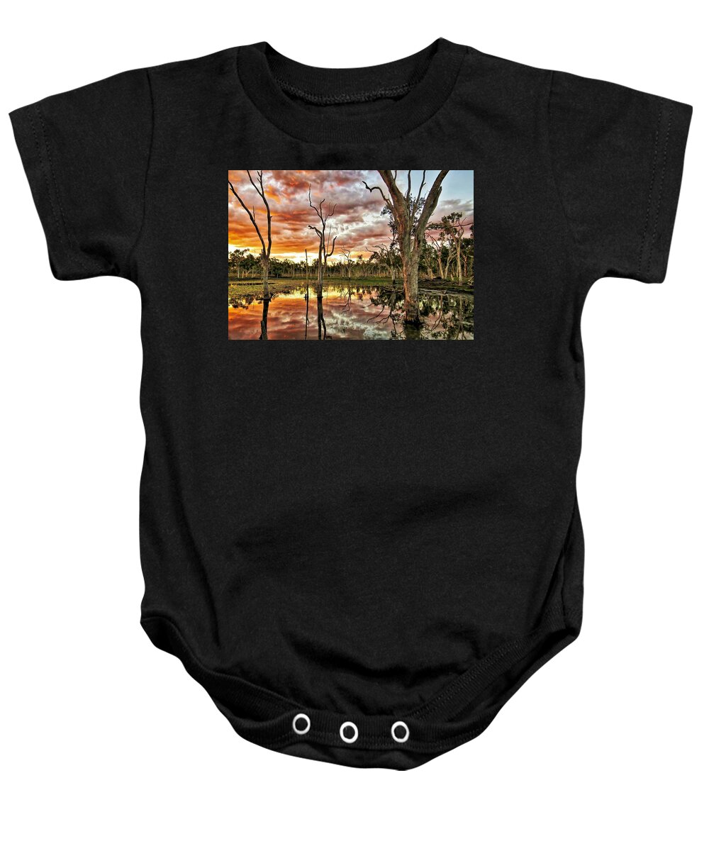 Sunset View Baby Onesie featuring the photograph Sunset at Minnamoolka 3 by Joan Stratton