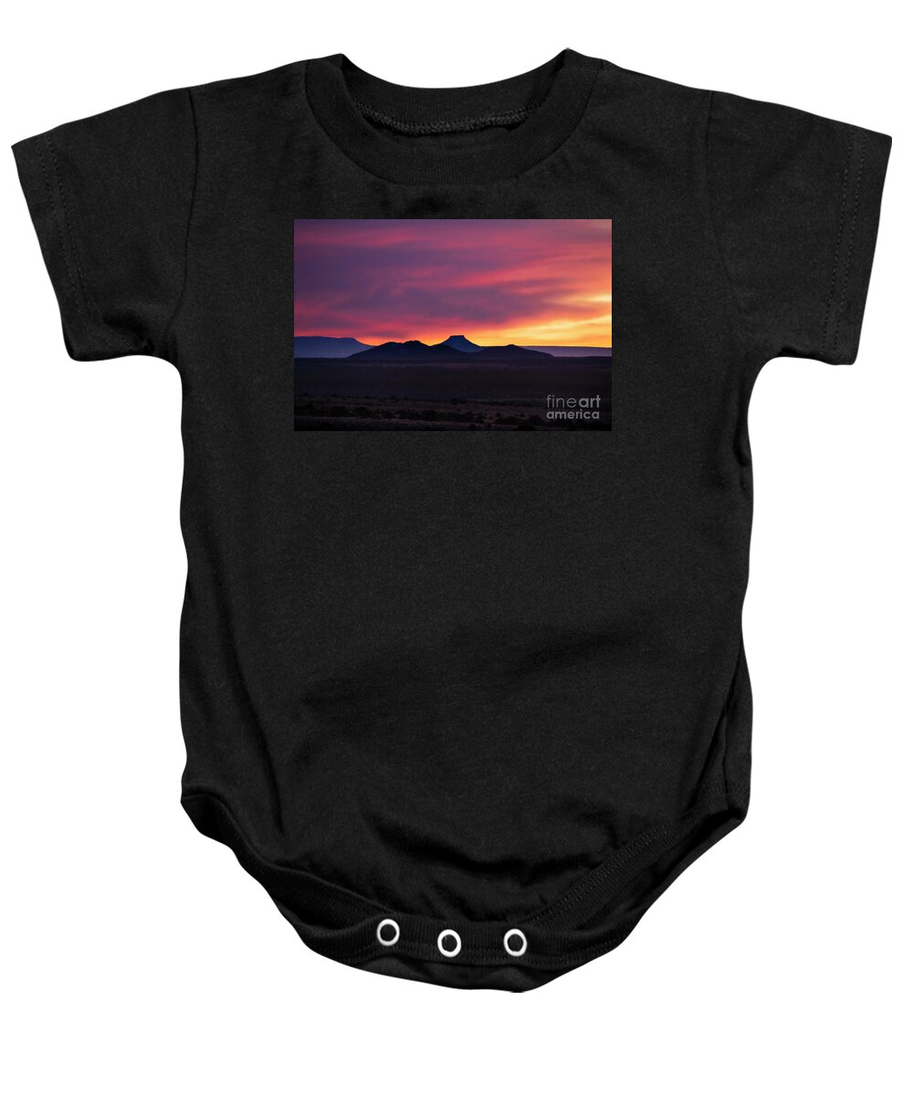 Taos Baby Onesie featuring the photograph Sunset with Cerro Pedernal by Elijah Rael