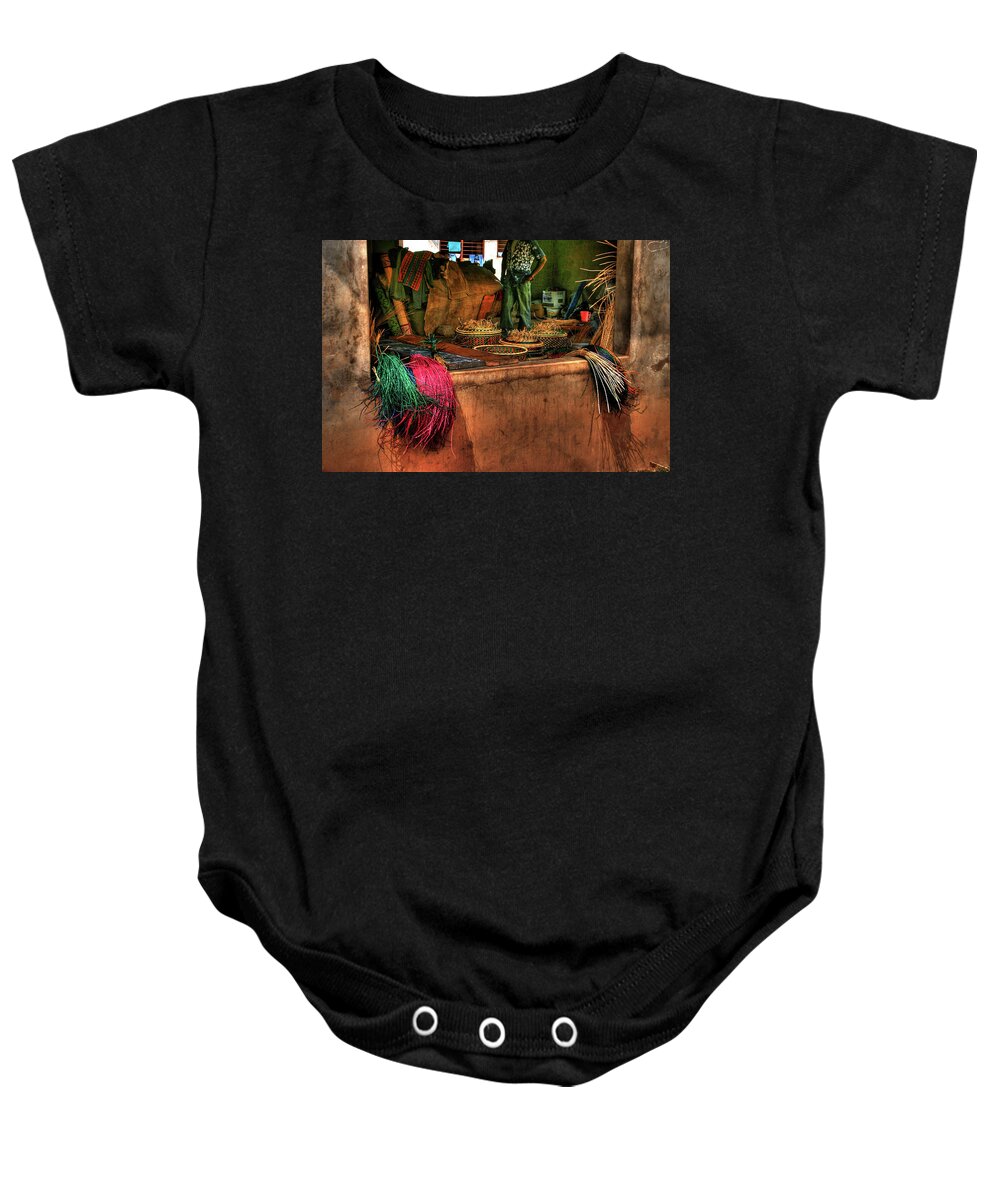 Basket Baby Onesie featuring the photograph The Basket Cooperative by Wayne King