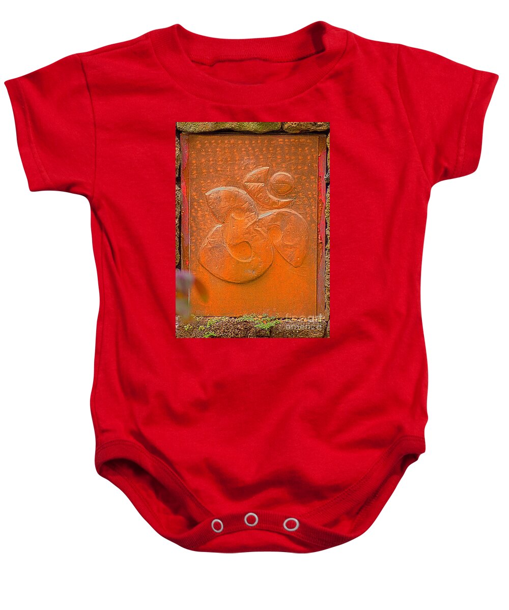 Primordial Sound Baby Onesie featuring the photograph The Ancient Sound Of OM by Roselynne Broussard