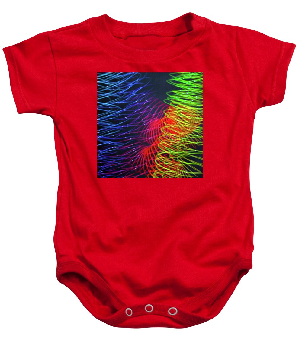 Abstract Baby Onesie featuring the photograph Slinky in Motion #2 by Ira Marcus