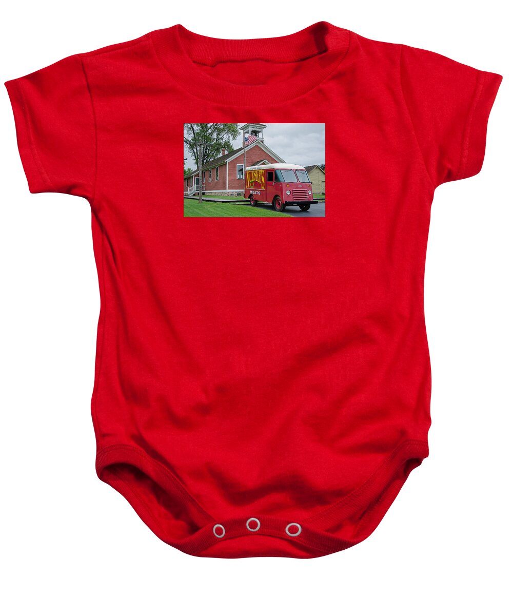 Nueske Meat Store Baby Onesie featuring the photograph Nueske Meat Store by Susan McMenamin