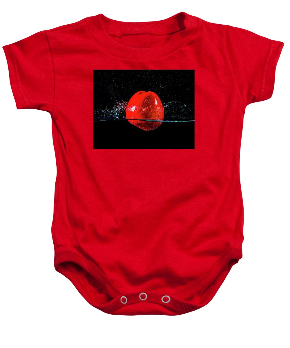 Photograph Baby Onesie featuring the photograph Red Apple splash by Terril Heilman