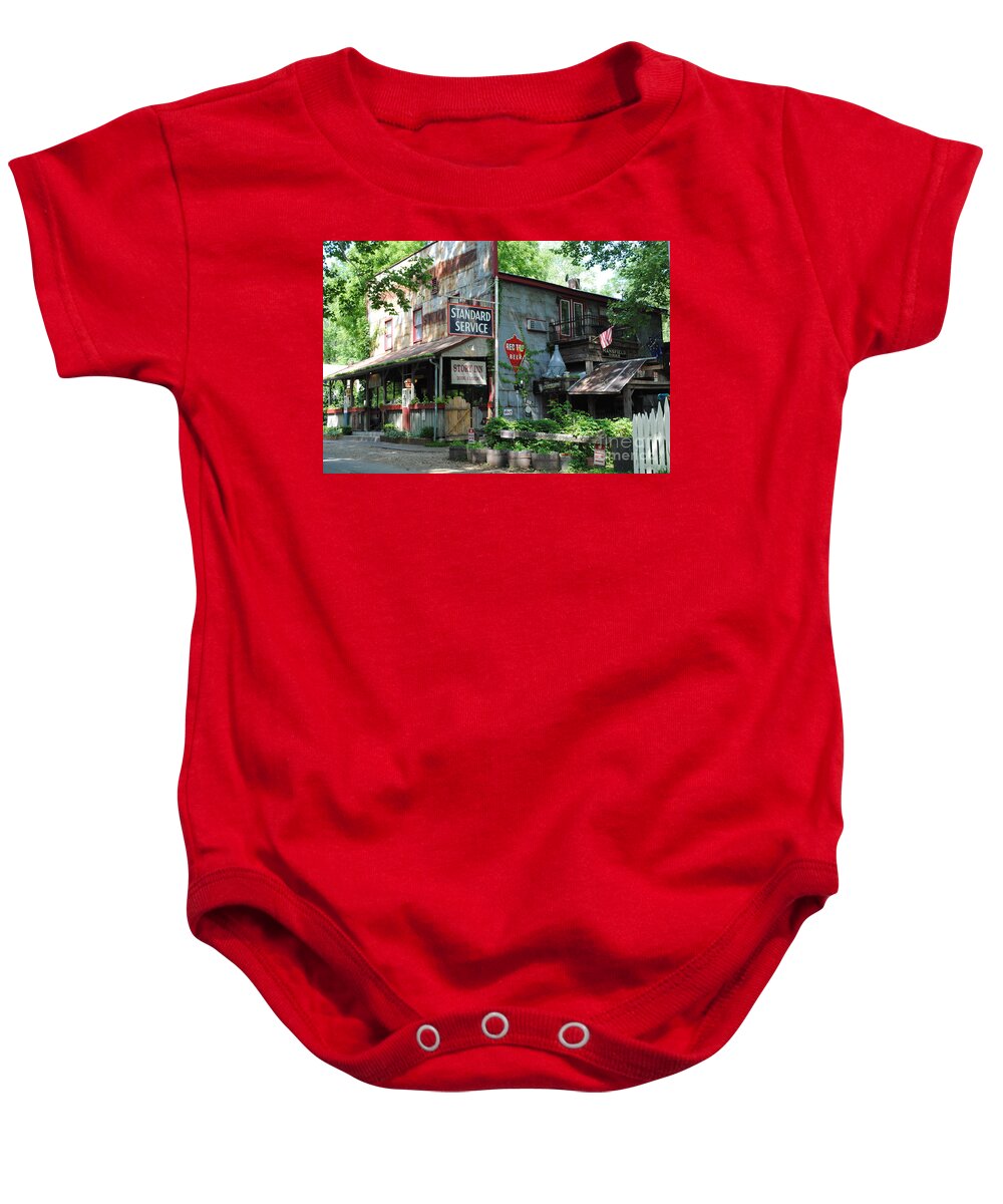 Standard Baby Onesie featuring the photograph The Ole Gas Station by Jost Houk