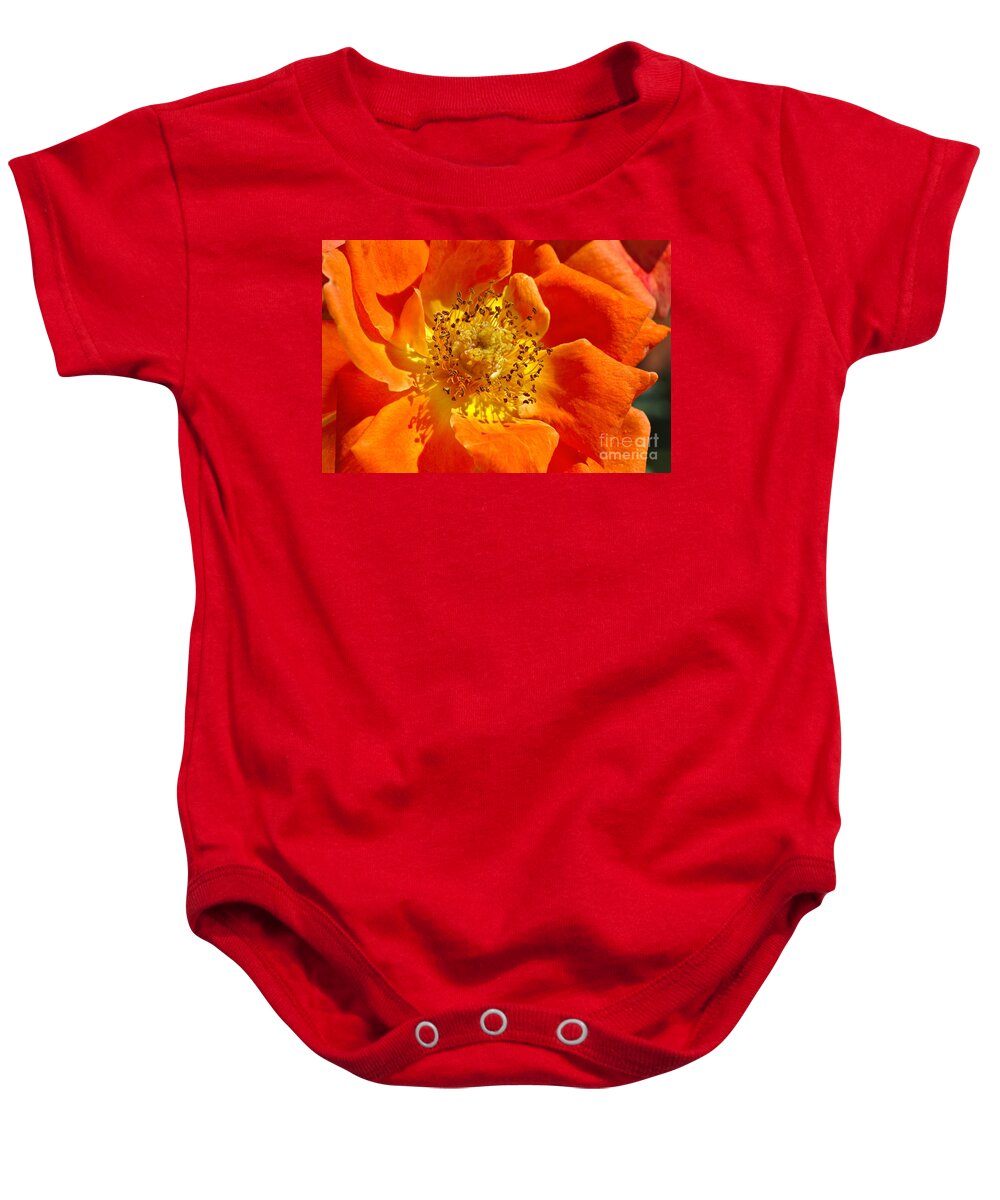 Rose Baby Onesie featuring the photograph Heart Of The Orange Rose by Joy Watson