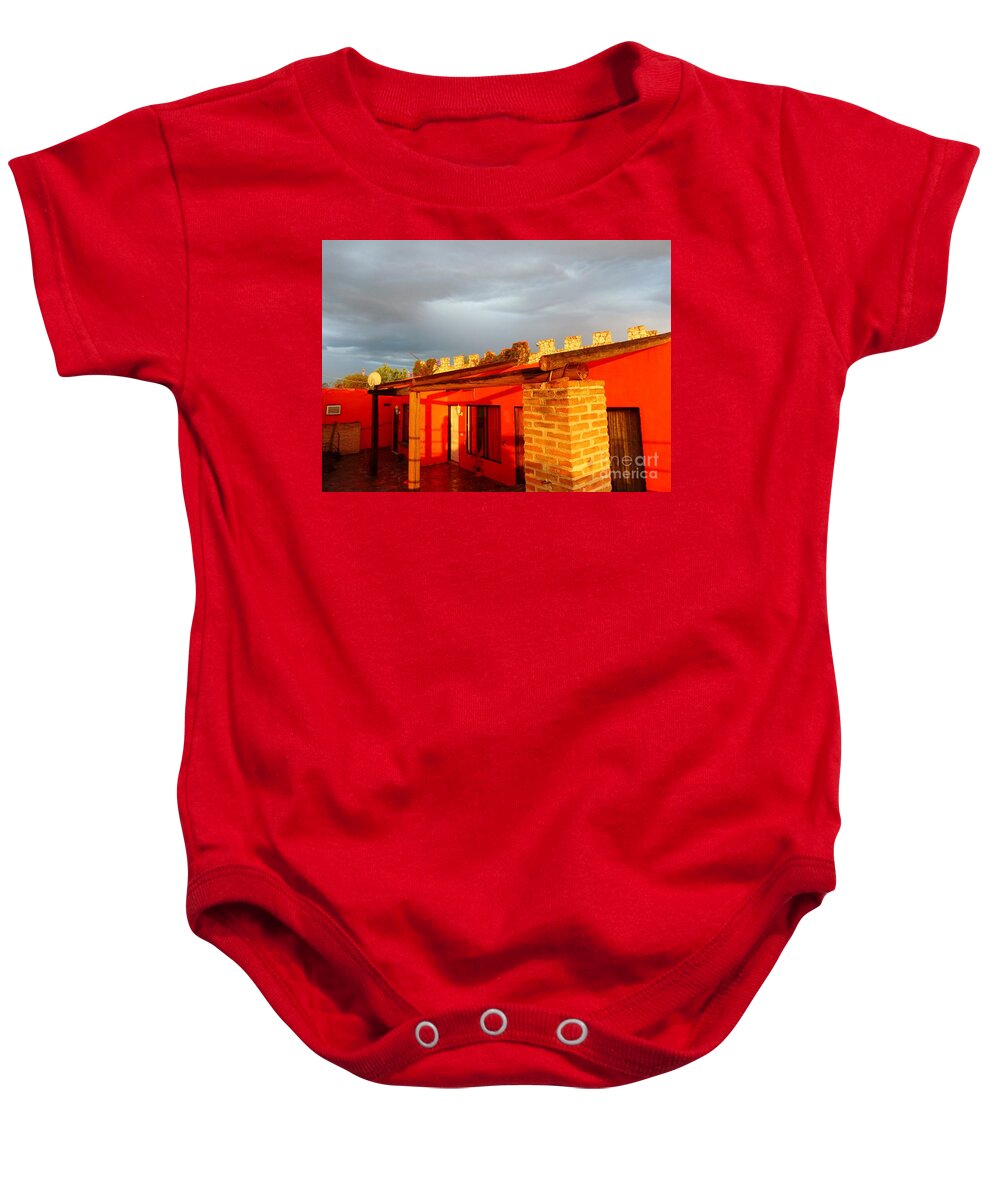 Red Building Reflecting Setting Sun Baby Onesie featuring the photograph Sun Setting Storm Brewing by Rosanne Licciardi