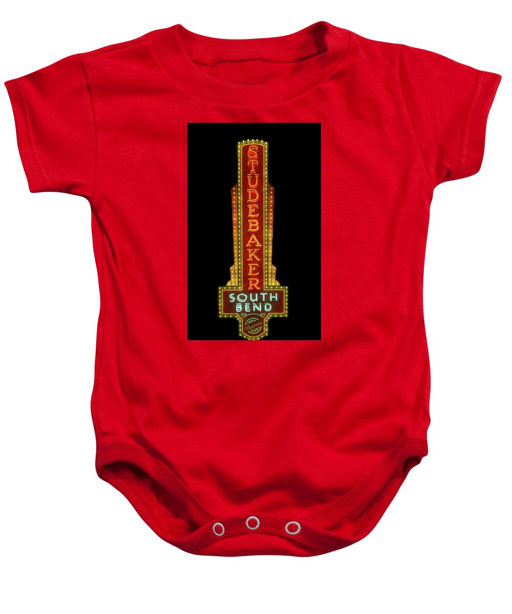 Studebaker Baby Onesie featuring the photograph Studebaker Neon Sign by Susan Rissi Tregoning