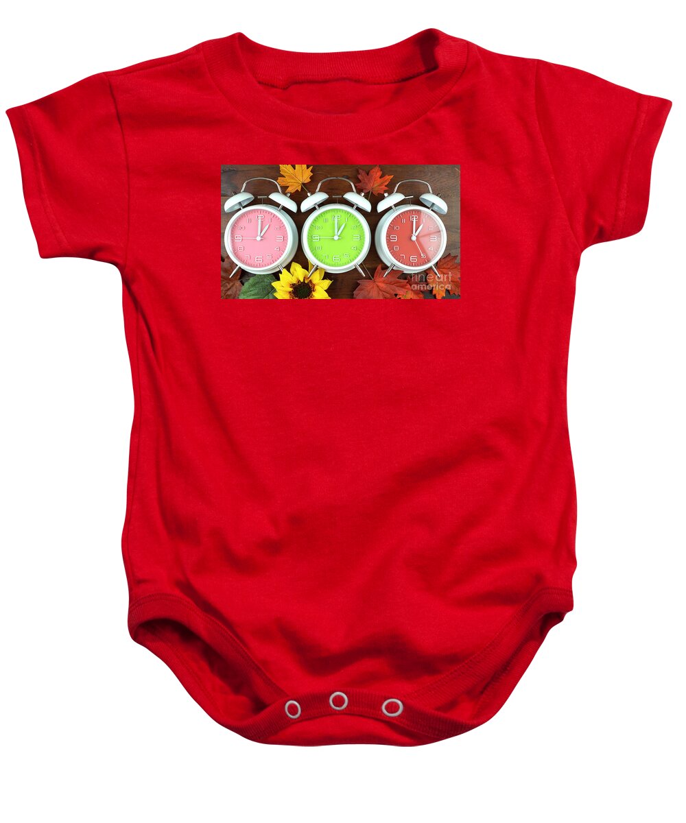 Alarm Baby Onesie featuring the photograph Autumn Fall Daylight Saving Time Clocks #1 by Milleflore Images