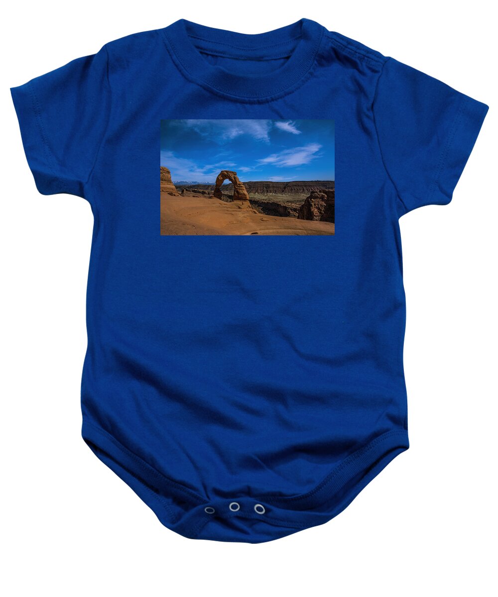 Delicate Arch Baby Onesie featuring the photograph Delicate Arch Mountain background by Jonathan Davison