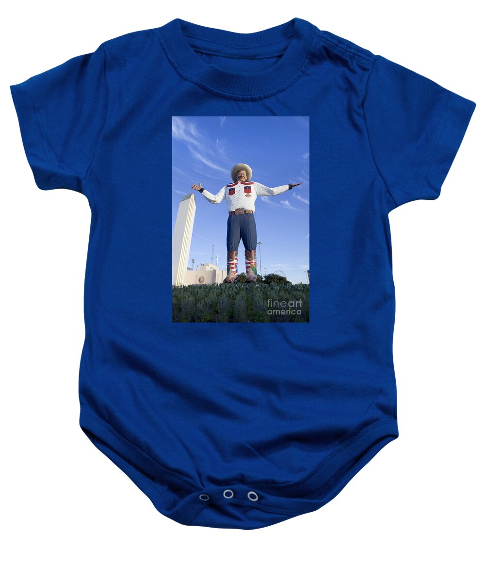 Big Tex Baby Onesie featuring the photograph Big Tex in Dallas Texas #1 by Anthony Totah