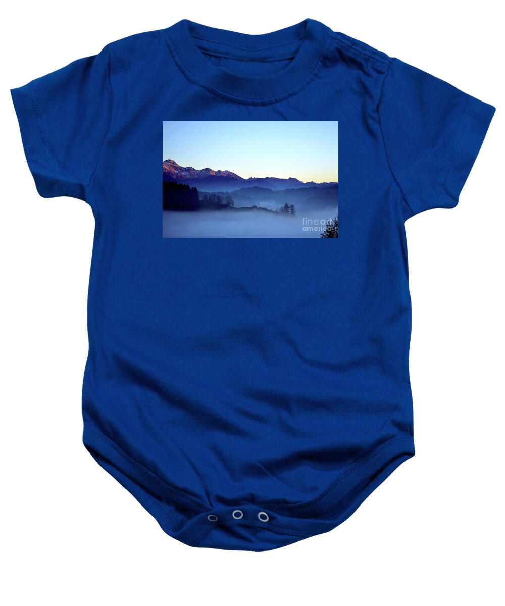 Fog Baby Onesie featuring the photograph Fog creeps up the valley - Switzerland by Susanne Van Hulst