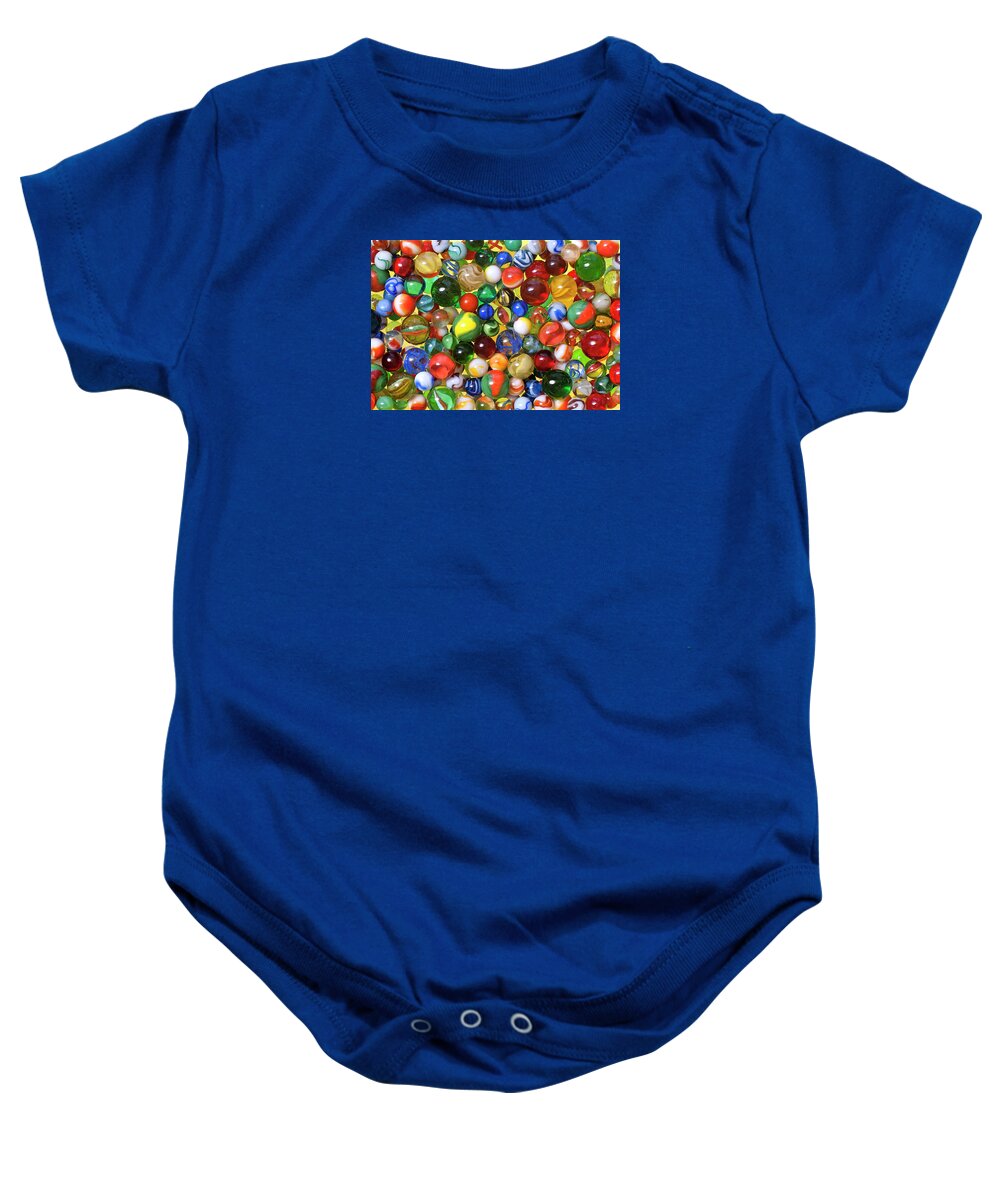 Jigsaw Puzzle Baby Onesie featuring the photograph Lose Your Marbles by Carole Gordon