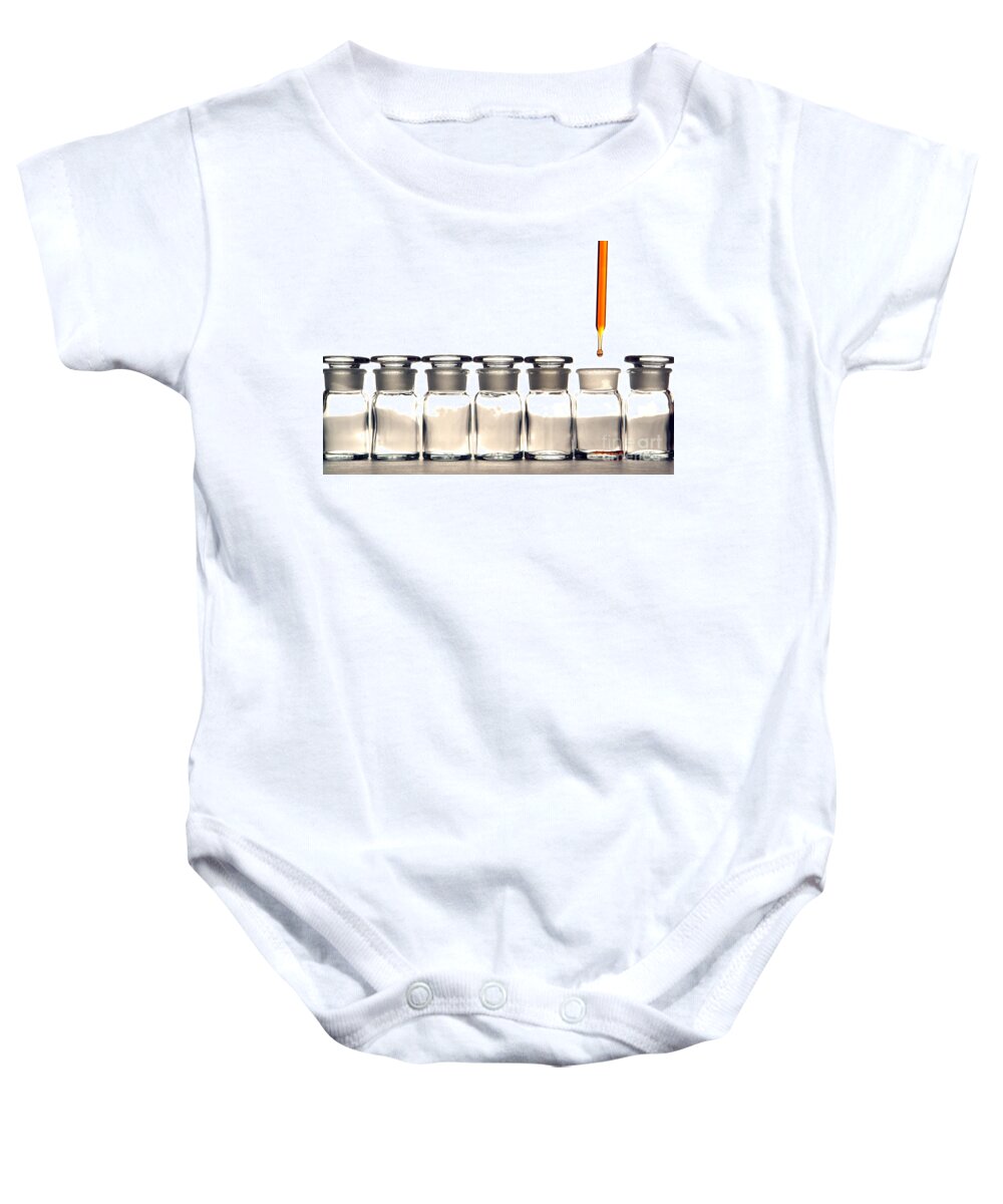 Bottles Baby Onesie featuring the photograph Laboratory Experiment in Science Research Lab by Science Research Lab By Olivier Le Queinec