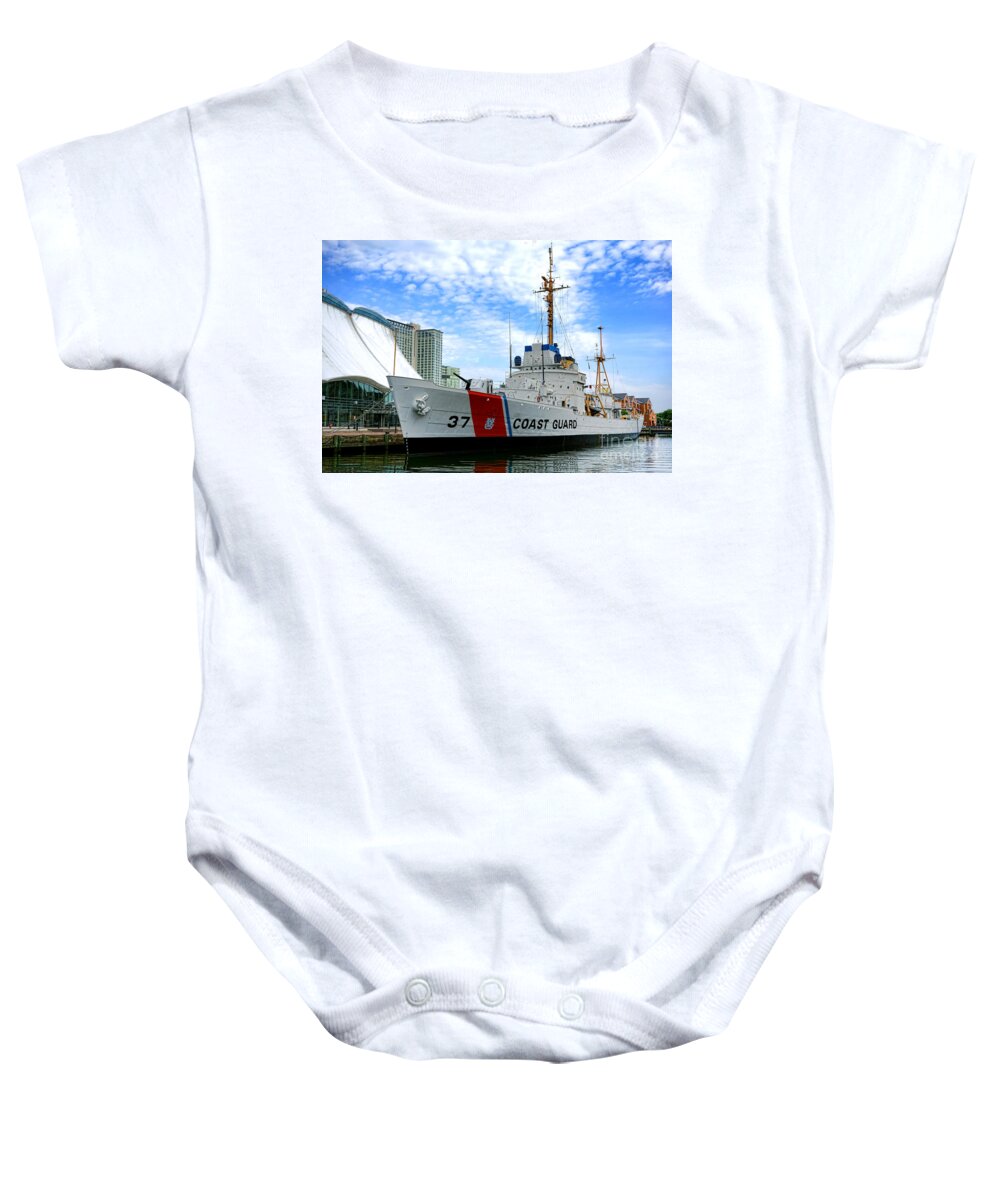 Coast Baby Onesie featuring the photograph Coast Guard Cutter Taney by Olivier Le Queinec