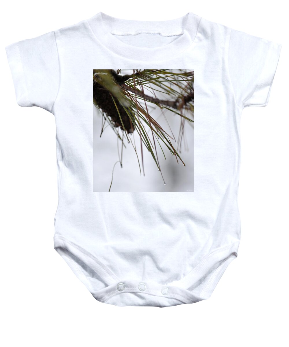 December's Raindrops Baby Onesie featuring the photograph December's Raindrops by Maria Urso