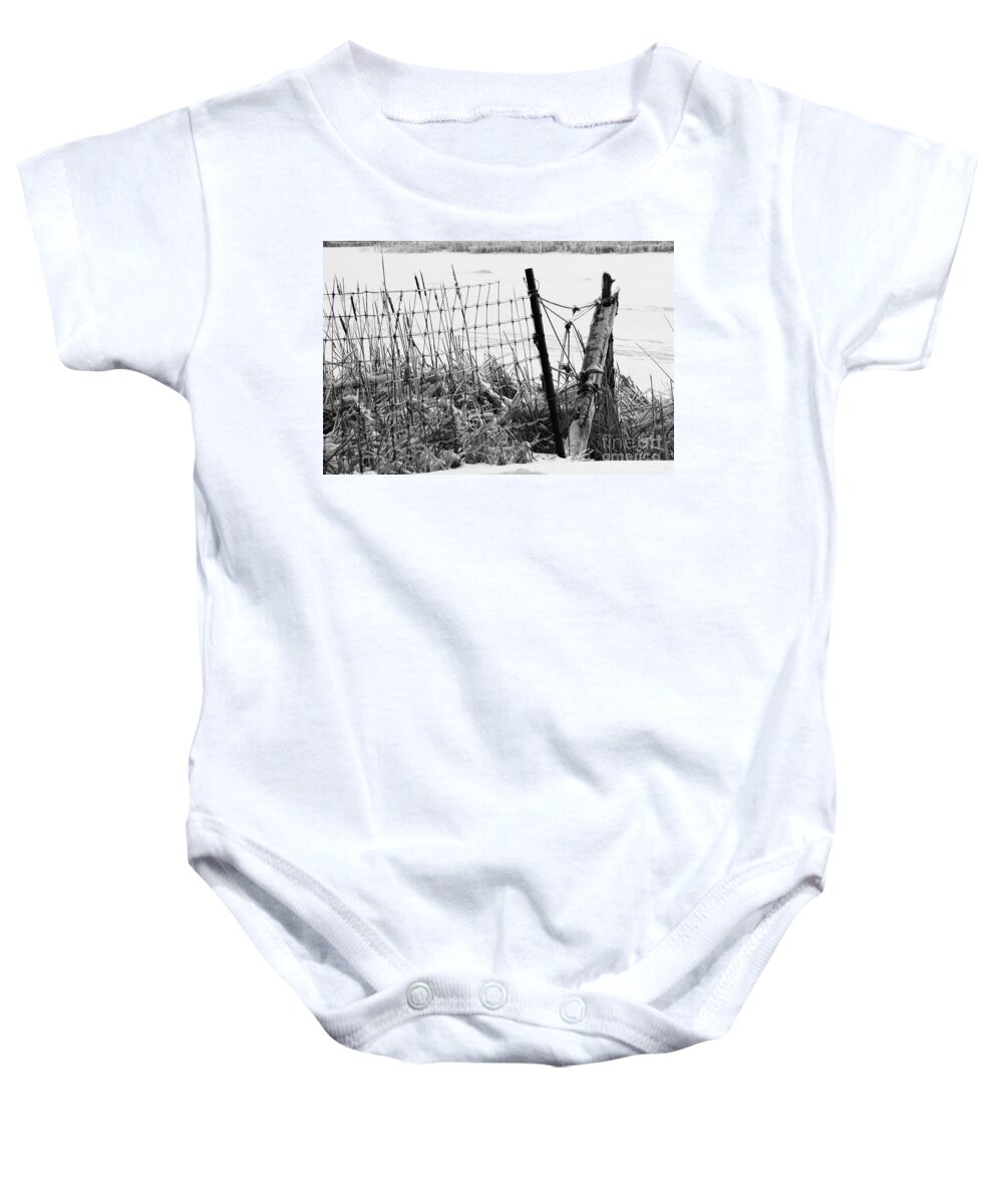 Ice Baby Onesie featuring the photograph Ice coated wire fence and rushes after a winter storm by Louise Heusinkveld