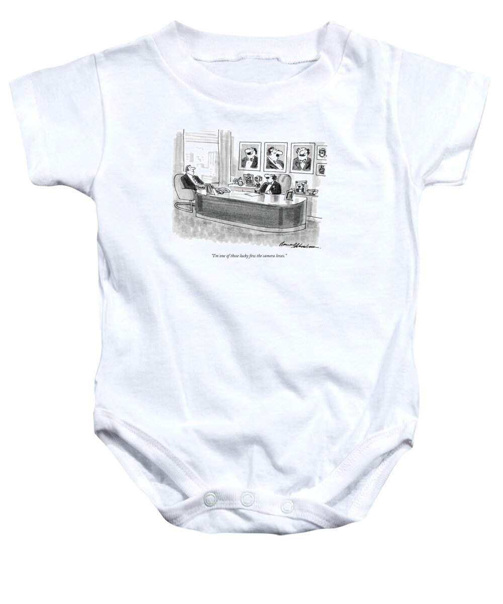 

 Business Man To Client As He Sits Behind Large Desk And In Front Of A Wall Of Photographs Of Himself. - 
Photography Baby Onesie featuring the drawing I'm One Of Those Lucky Few The Camera Loves by Bernard Schoenbaum